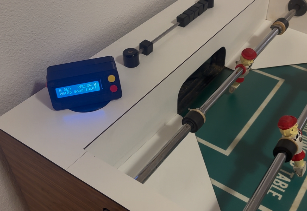 My electronic scoreboard installed beside the foosball table