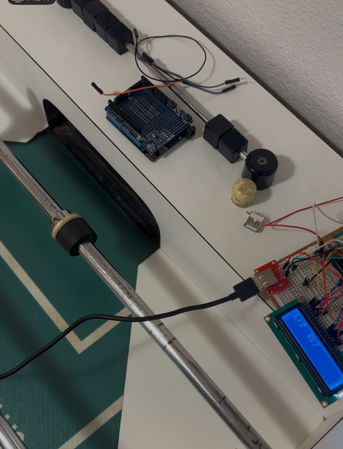 My breadboard and display prototype beside the table